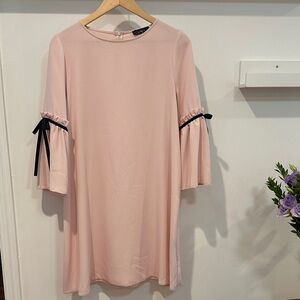 Chic Long Sleeve Pink Dress with Black Ribbon Accents